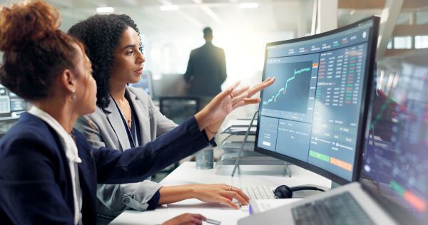 Two women looking at increasing prices